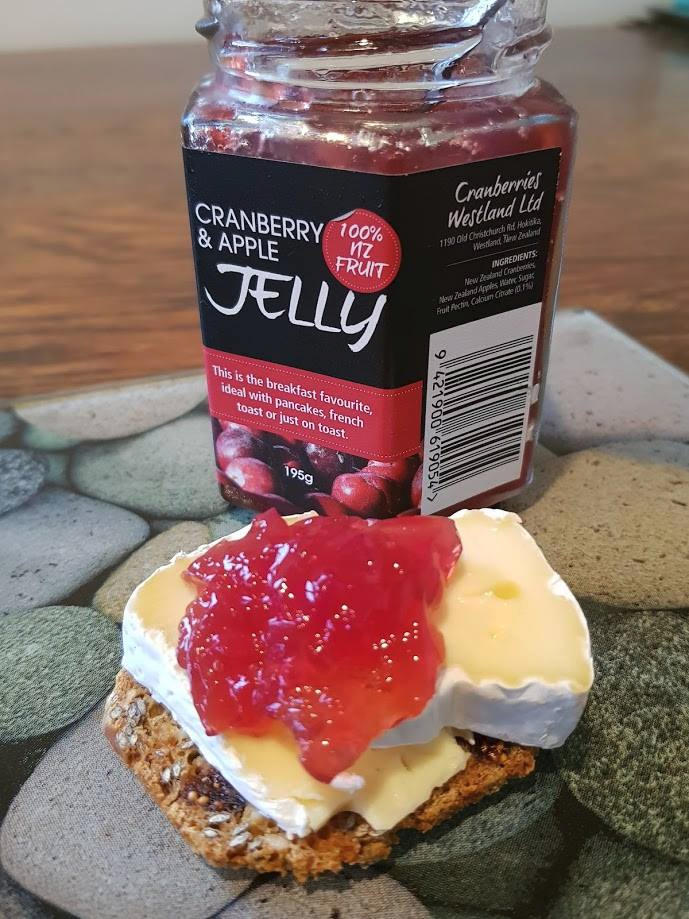 Cranberry and apple jelly on cheese.